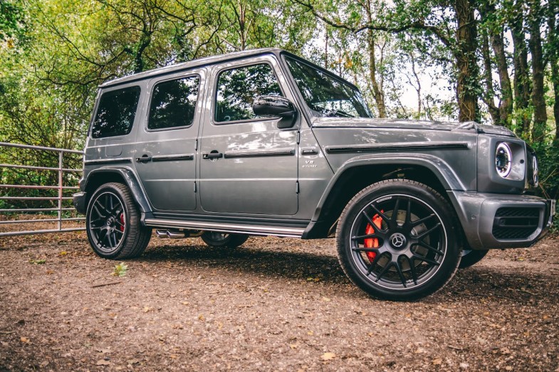 MERCEDES-BENZ G CLASS PARKED ON DIRT ROAD