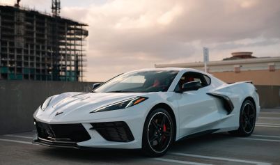 CHEVROLET CORVETTE ON PARKING LOT ON ROOF