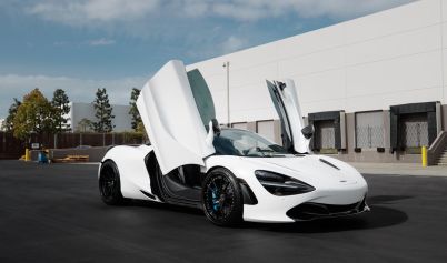 PARKED WHITE LUXURY CAR