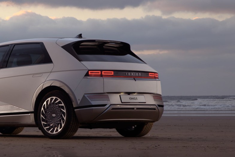 A CAR PARKED ON THE SEASHORE HYUNDAI IONIQ 5