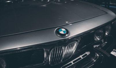 GRAYSCALE PHOTOGRAPHY OF BMW CAR