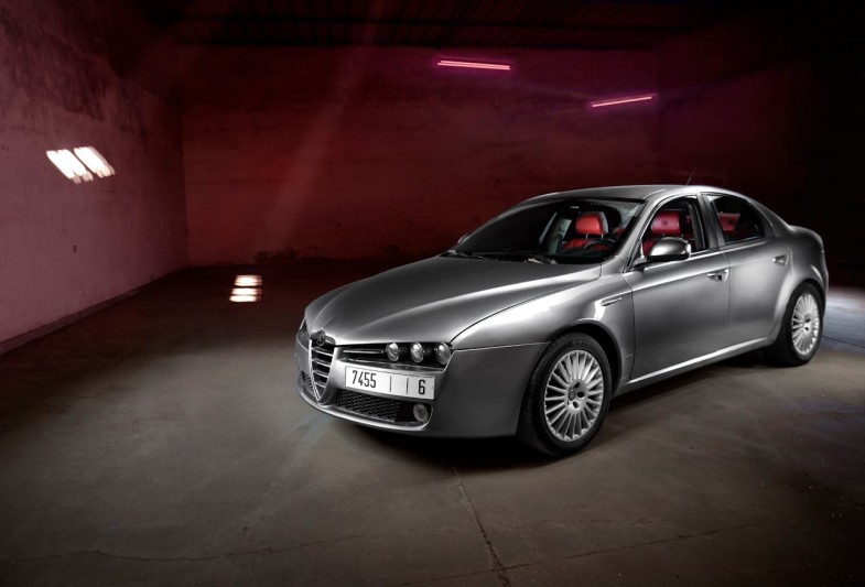 SILVER ALFA ROMEO IN GARAGE