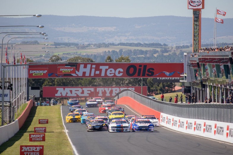 RACING CARS ON RACE TRACK