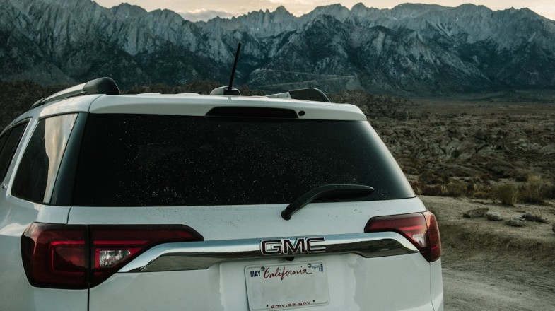WHITE GMC SUV