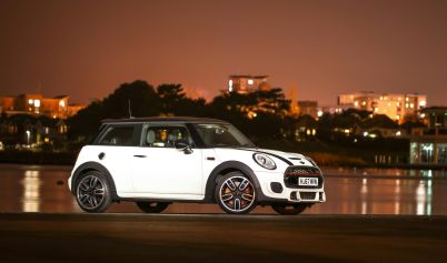 WHITE AND BLACK MINI COOPER