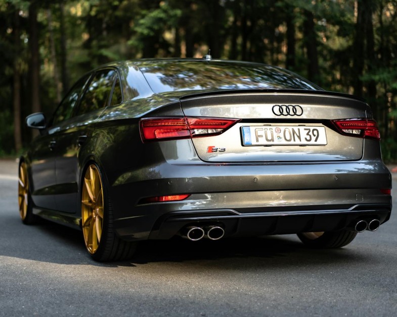 BLACK SEDAN CAR PARKED ON A CONCRETE ROAD AUDI S3