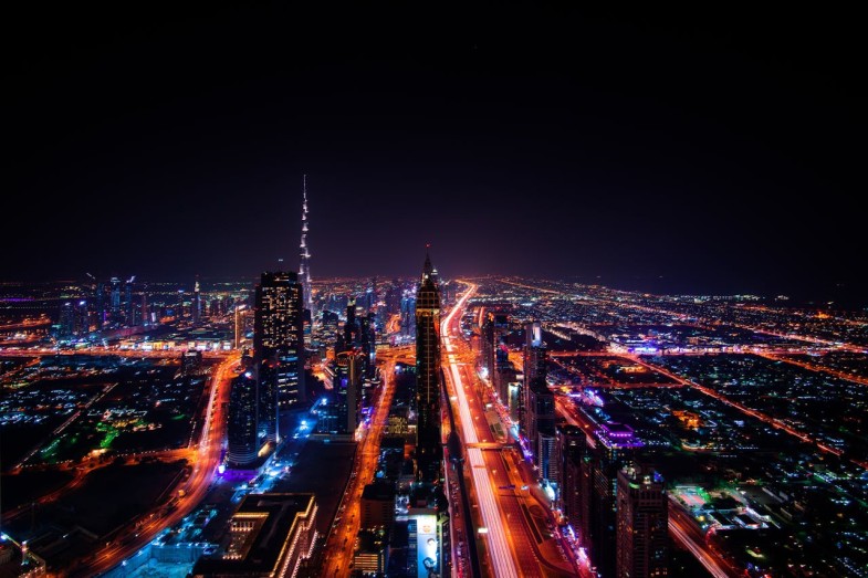 HIGHRISE BUILDINGS DURING NIGHT TIME PHOTO
