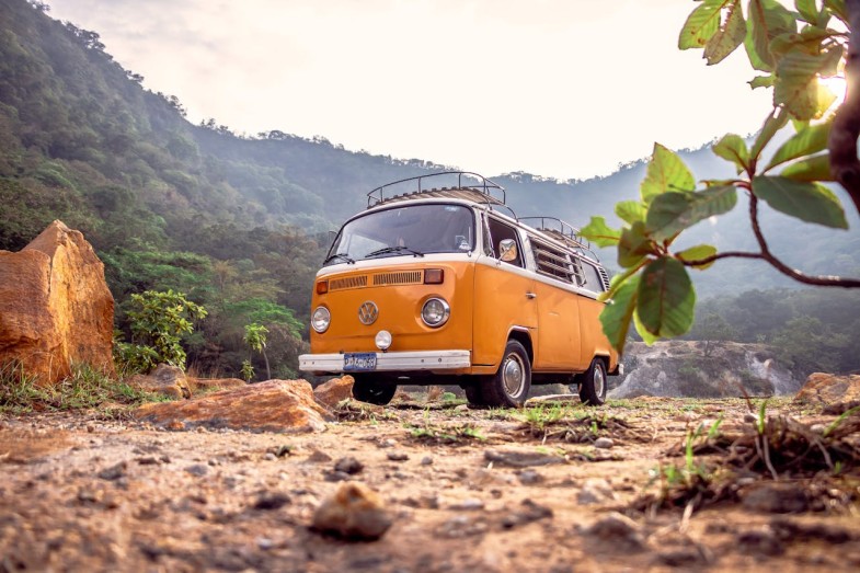 PHOTO OF YELLOW VAN DURING DAYTIME VOLKSWAGEN