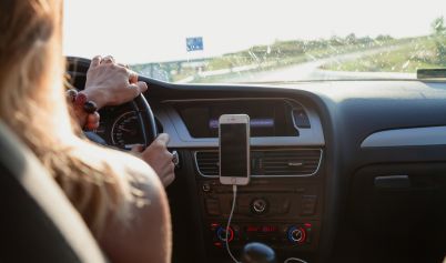 PHOTO OF PERSON DRIVING
