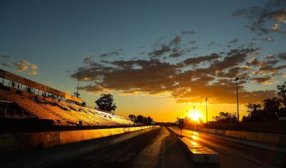 BLACK TOP ROAD DURING SUNSET