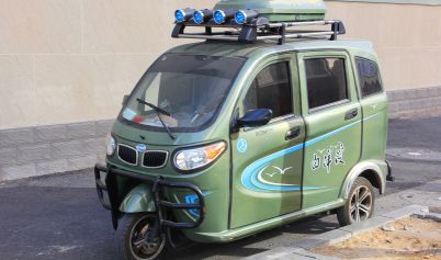 ELECTRIC CAR TRABSPORTATION , THREE-WHEELED TYPES