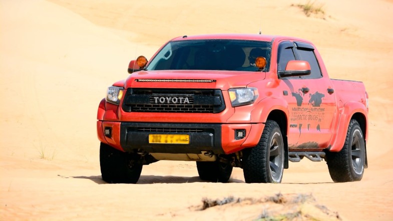 A PICKUP TRUCK ON THE DESERT TOYOTA
