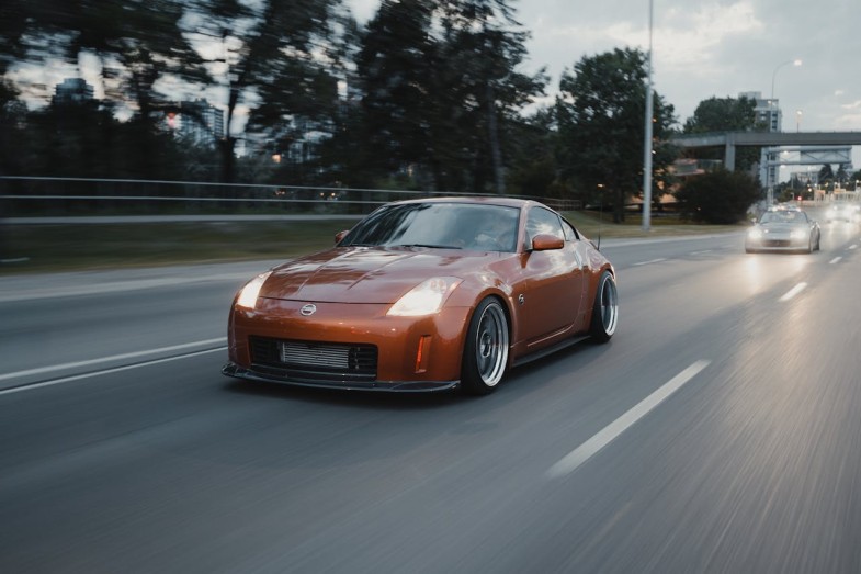 NISSAN SPORTSCAR DRIVING ON THE ROAD