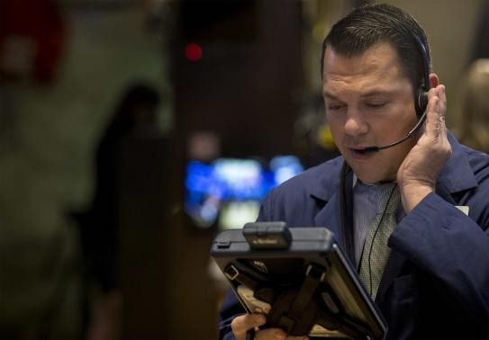 Wall Street climbs at open on solid earnings