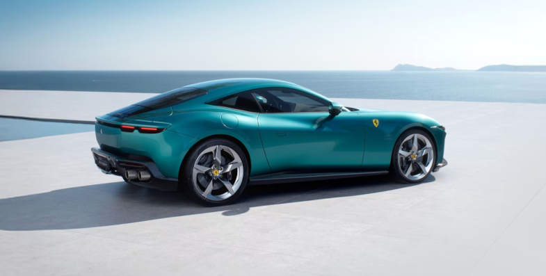 Teal Ferrari Amalfi coupe by the sea