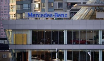 Daimler cuts car market forecast as Europe wobbles