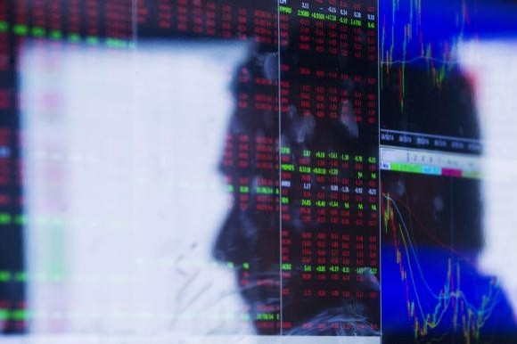 Wall St. ends down on Hong Kong tensions, Ford outlook