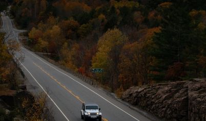 Car on a highway in autumn