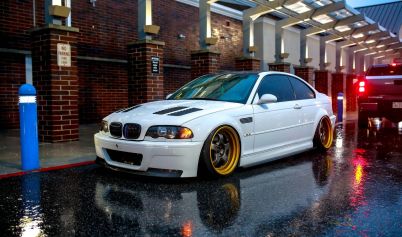 A PARKED WHITE BMW