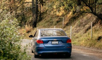 BLUE CHEVROLET ON ROAD