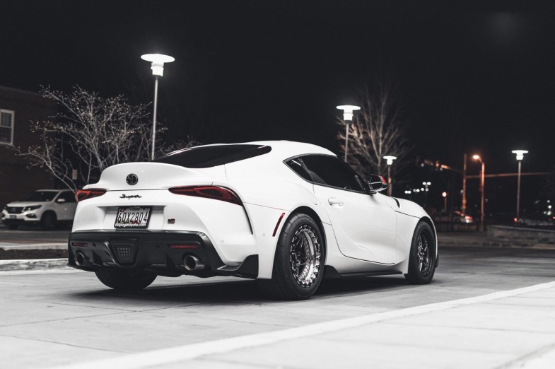 PHOTO OF PARKED WHITE TOYOTA SUPRA