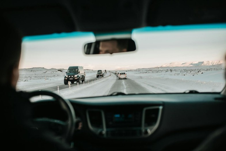 CARS ON SNOWY ROAD
