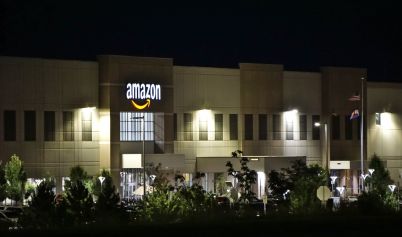AMAZON CONCRETE BUILDING DURING NIGHT TIME