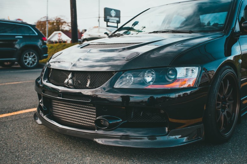 A SELECTIVE FOCUS ON FRONT VIEW OF A SPORT CAR MISTUBISHI